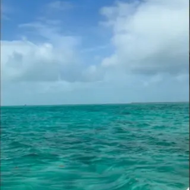 Turquoise ocean water on a family trip